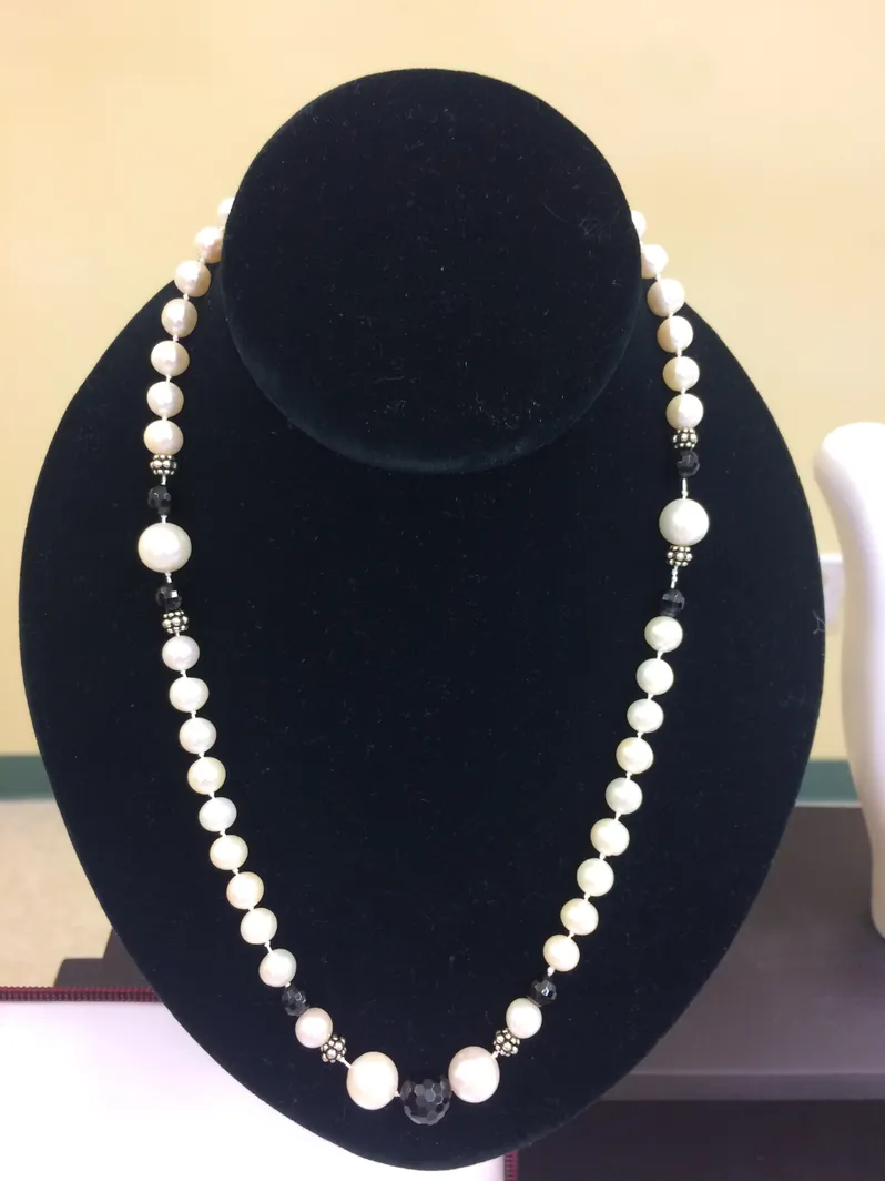 Fresh water pearls with Onyx and Sterling Silver Spacer